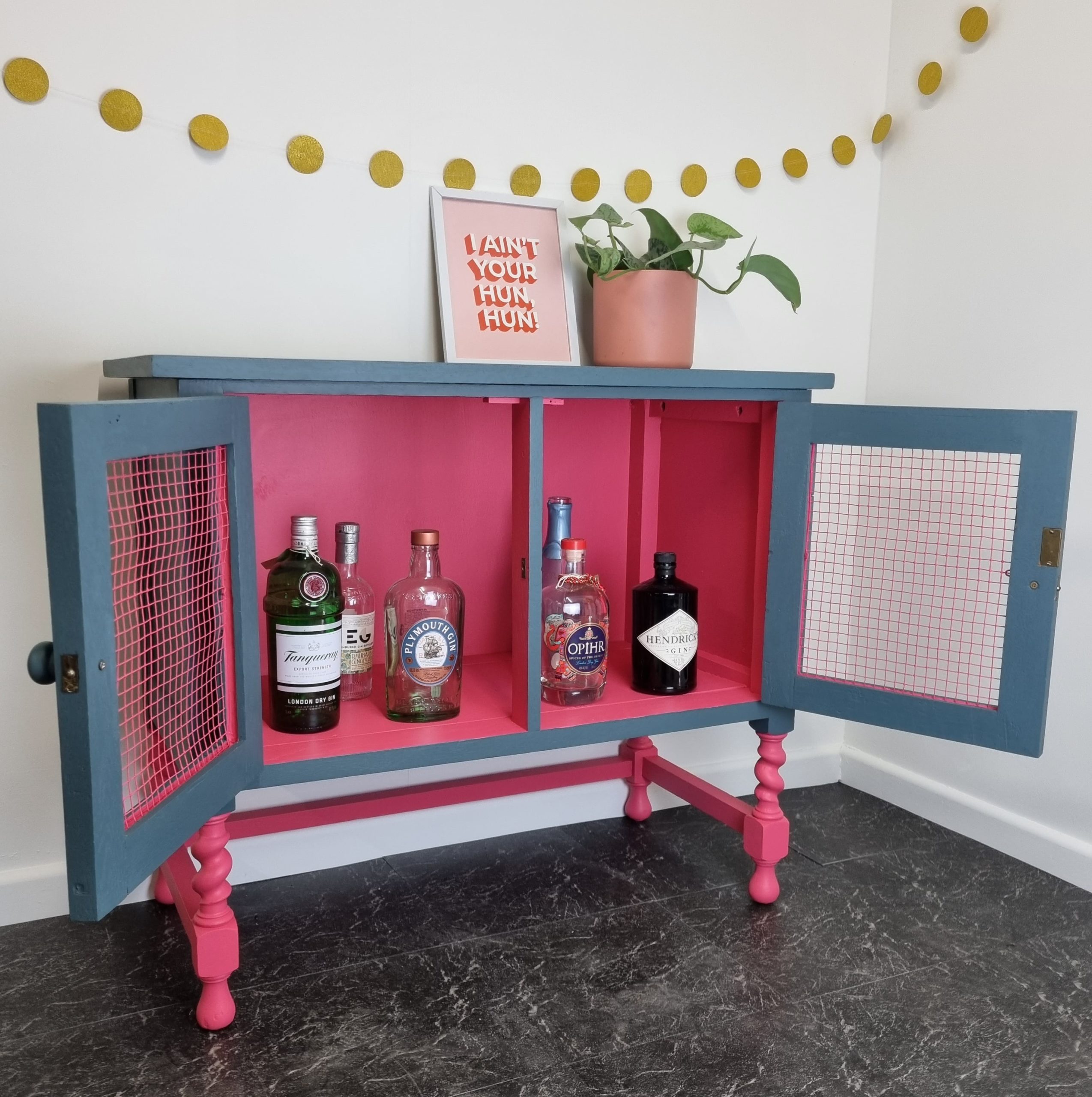 pink and blue drinks cabinet