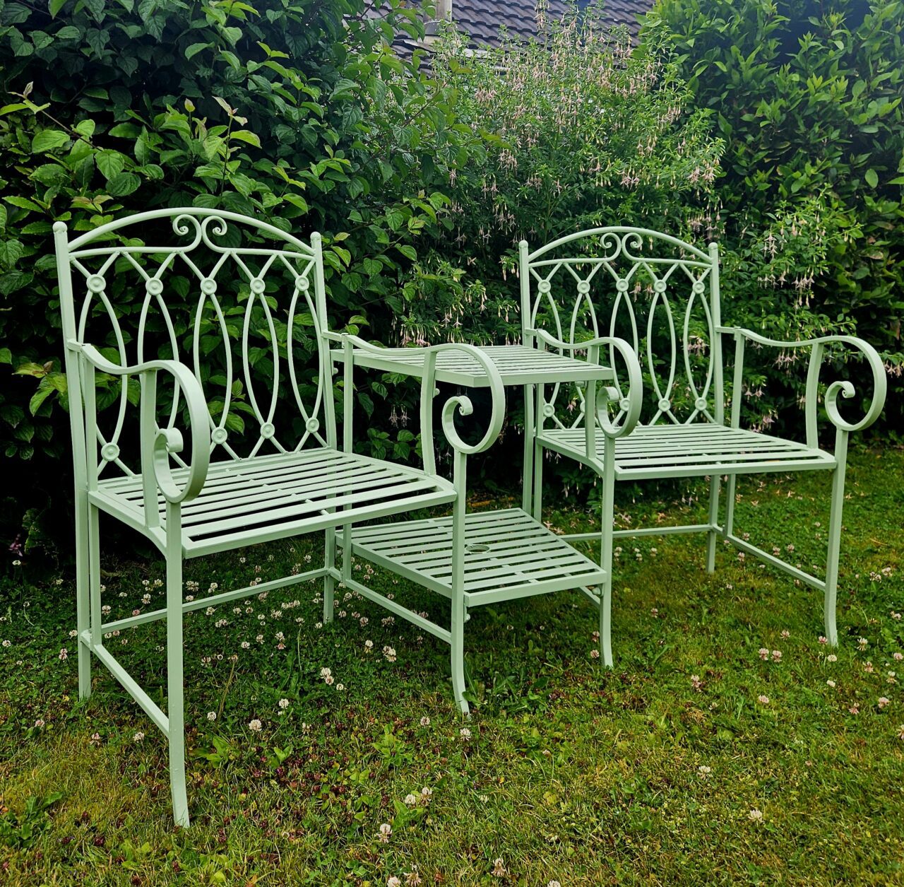 Metal garden seating in whirlybird green
